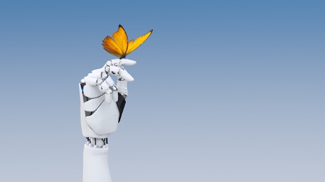 a robot hand with a butterfly perched on it